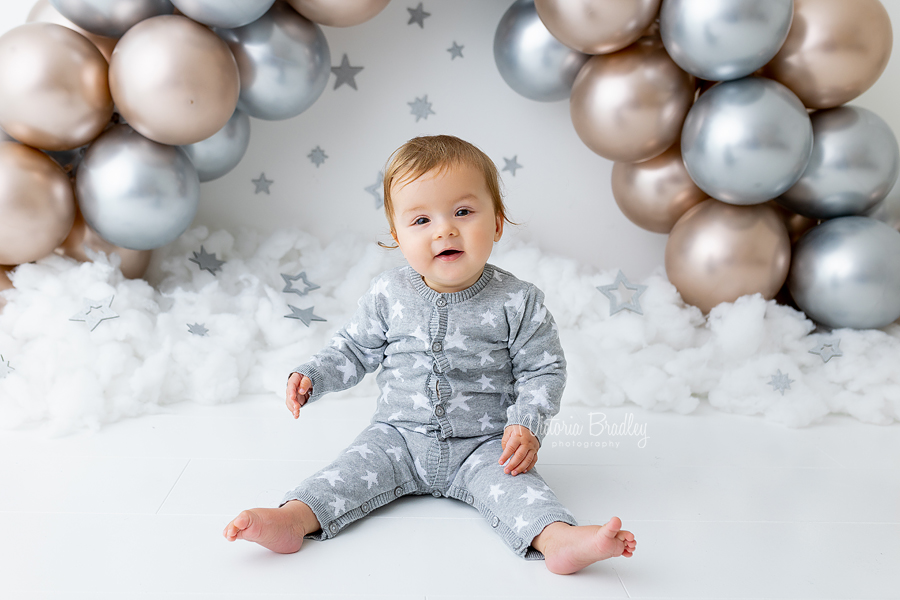 smiley baby boy sitter photography