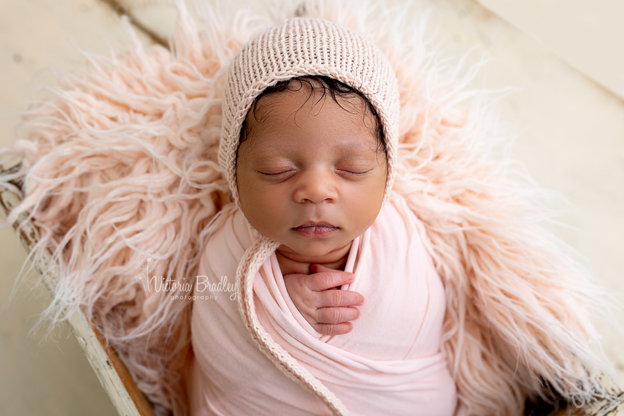 wrapped newborn in pink