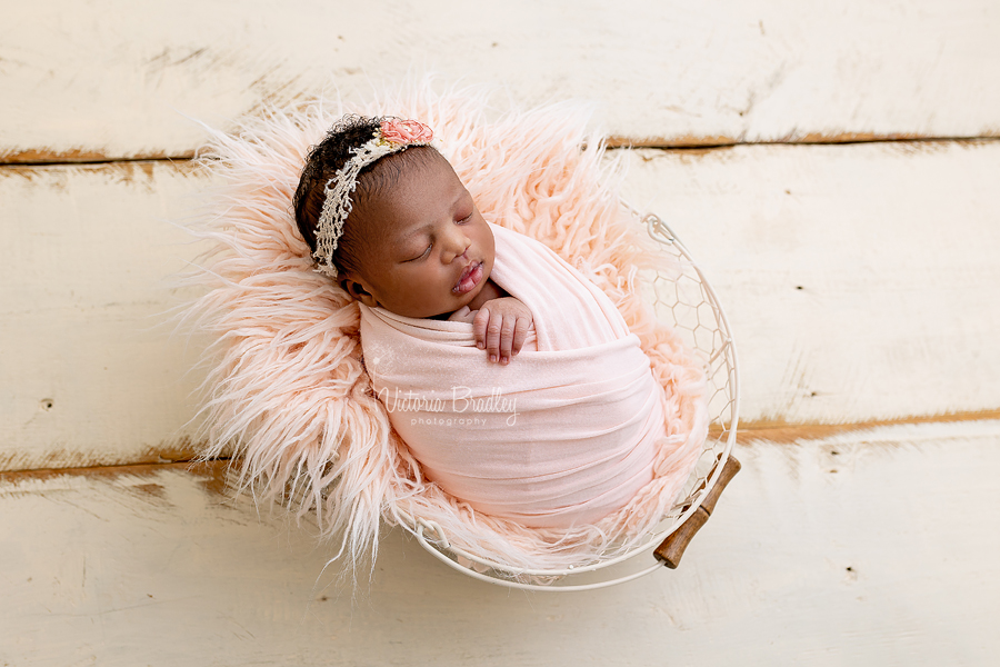 wrapped newborn in pink