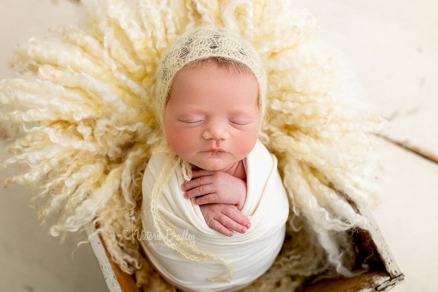 wrapped newborn in yellow