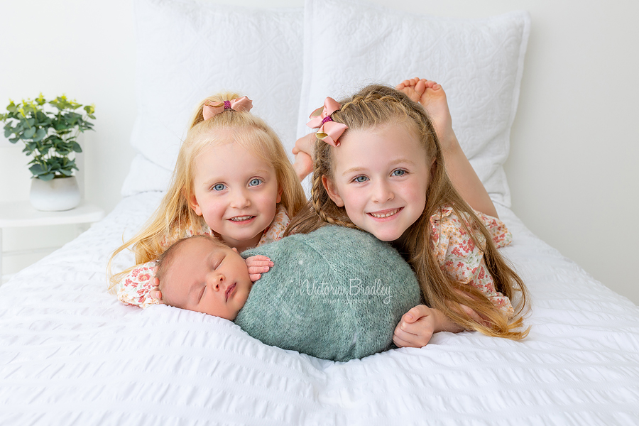 sibling and wrapped newborn photography
