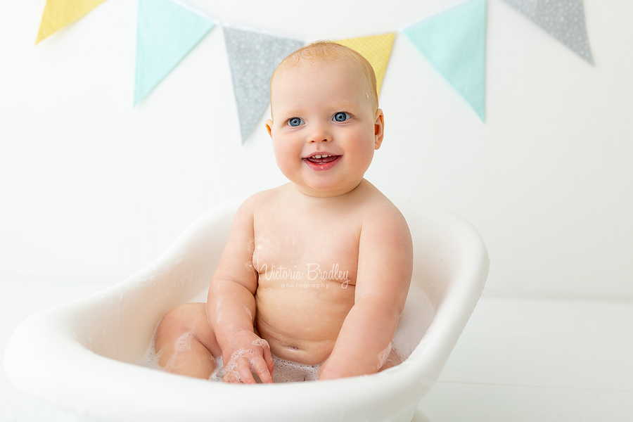 baby boy in bath tub