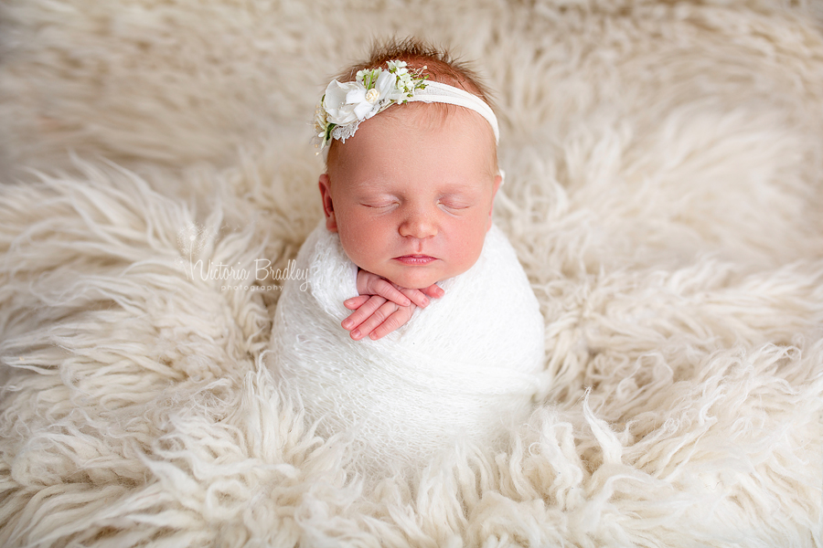 potato sack pose newborn baby photography