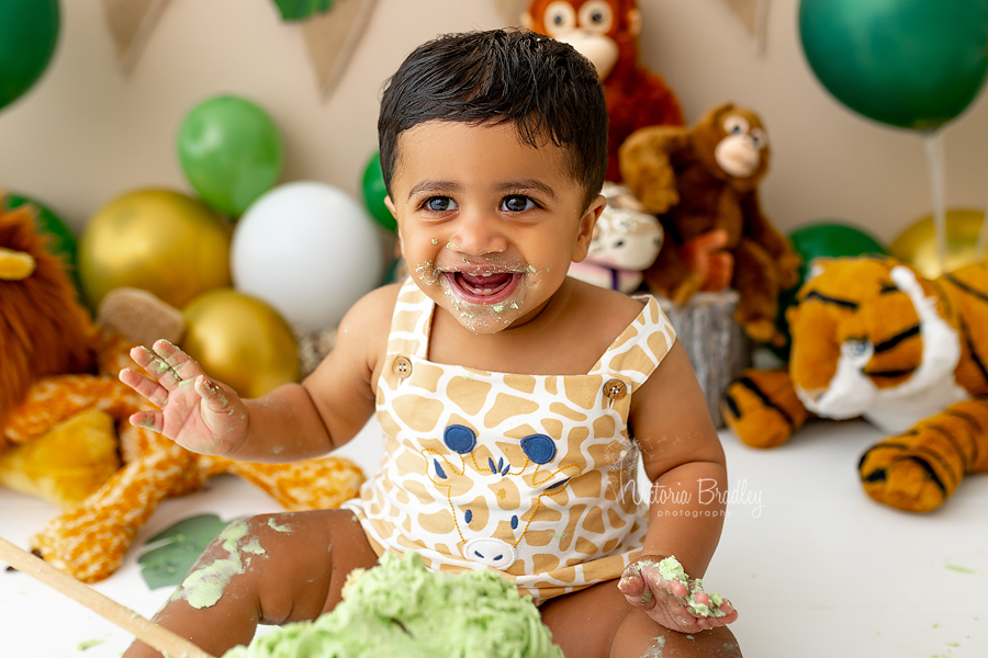 baby boy with green cake