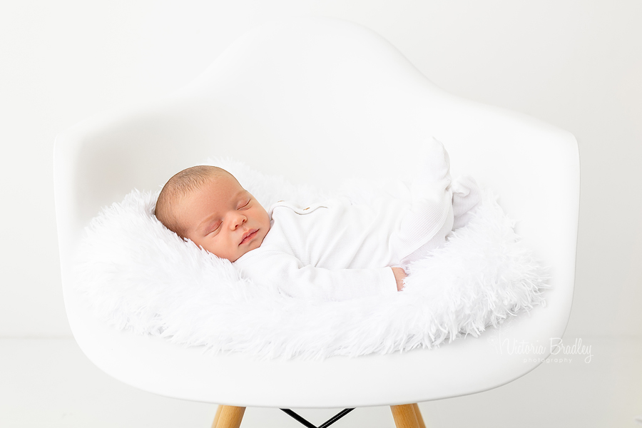 pure newborn photography, baby on chair