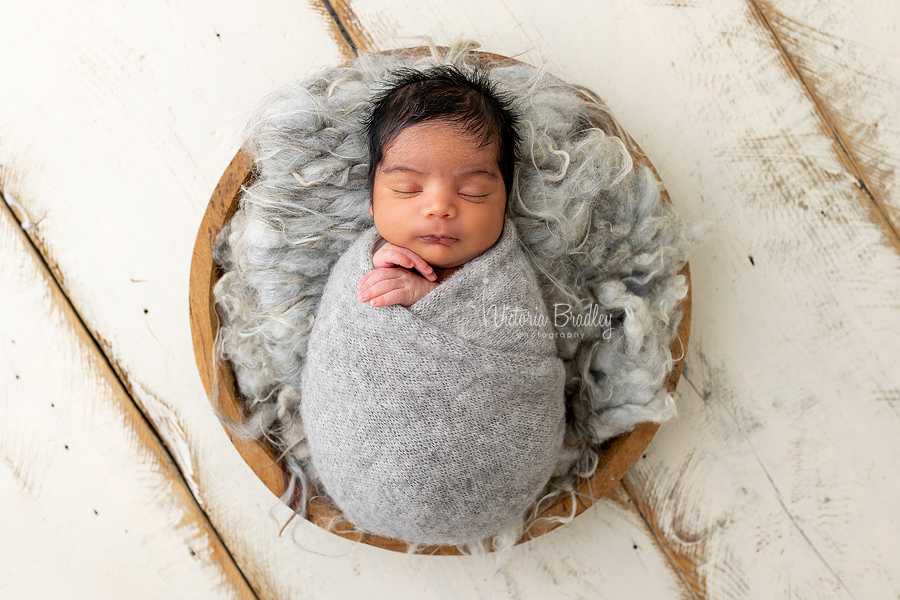 wrapped Newborn in grey wrap