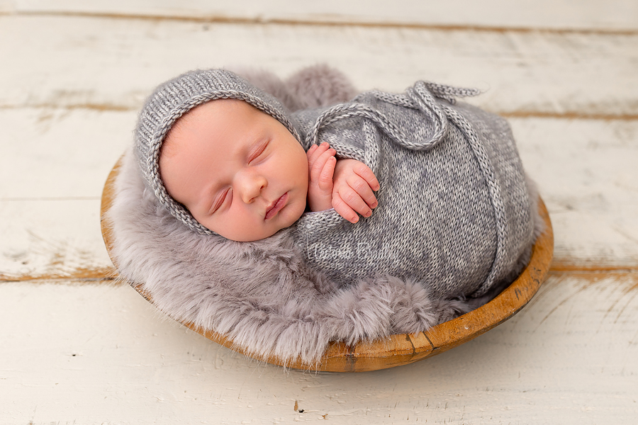 Newborn Baby Photography wrapped baby in grey