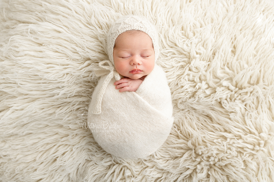 swaddled newborn