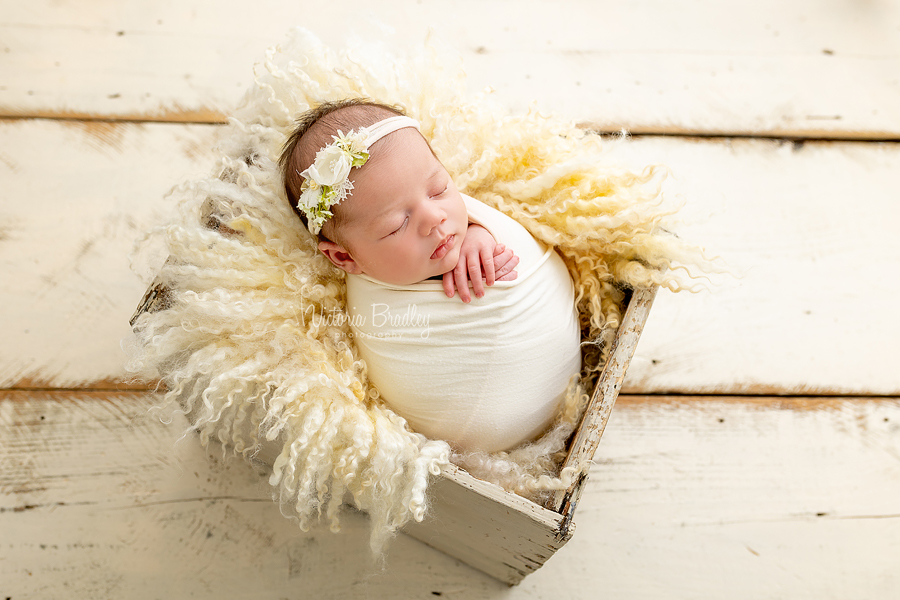  newborn in pale yellow